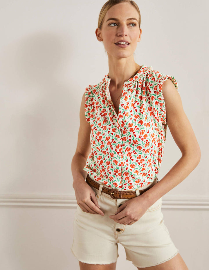 Daphne Frilly Sleeveless Shirt-Bright Papaya, Delicate Bud