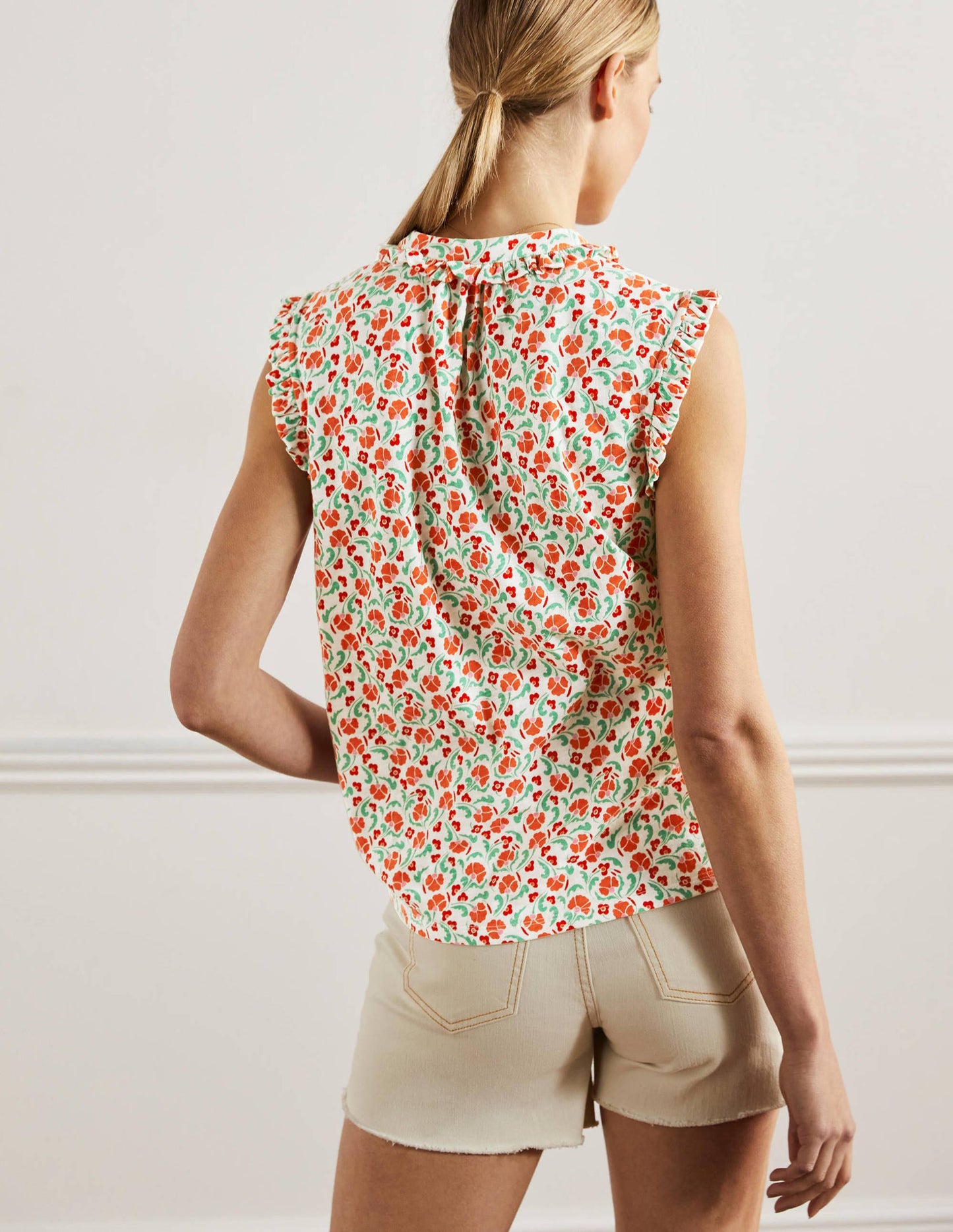 Daphne Frilly Sleeveless Shirt-Bright Papaya, Delicate Bud