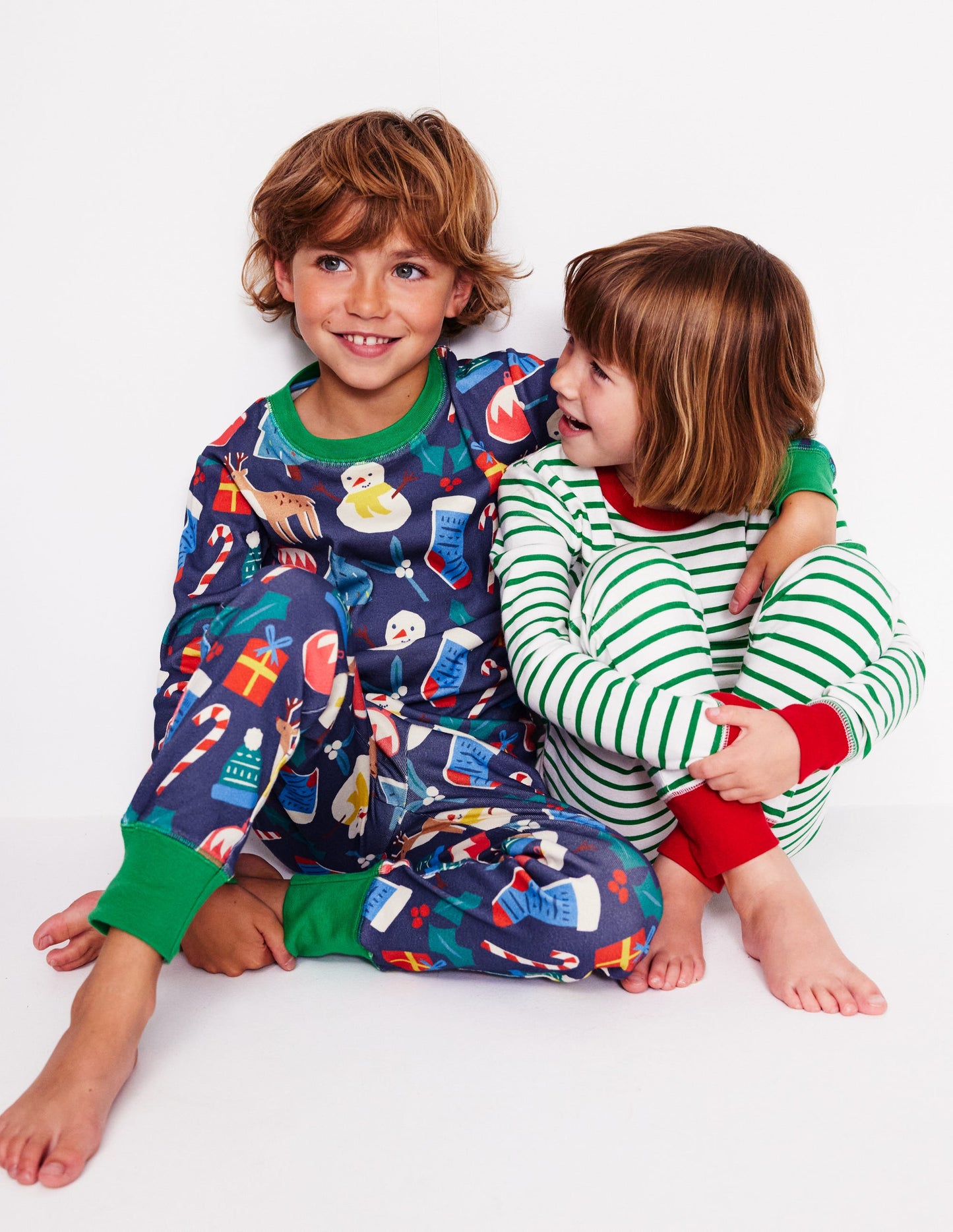 Snug Twin Pack Pyjamas-Christmas Presents and Stripe