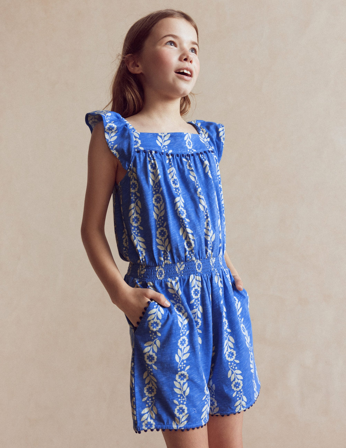 Ciara Pom Trim Jersey Playsuit-Blue Floral - Image 1