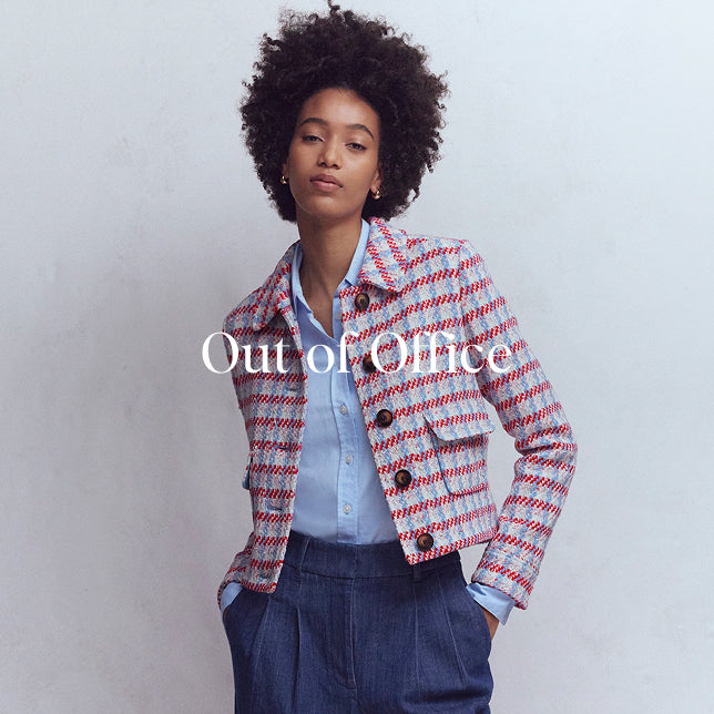 Woman wearing a patterned jacket over a blue shirt with 'Out of Office' text overlay.