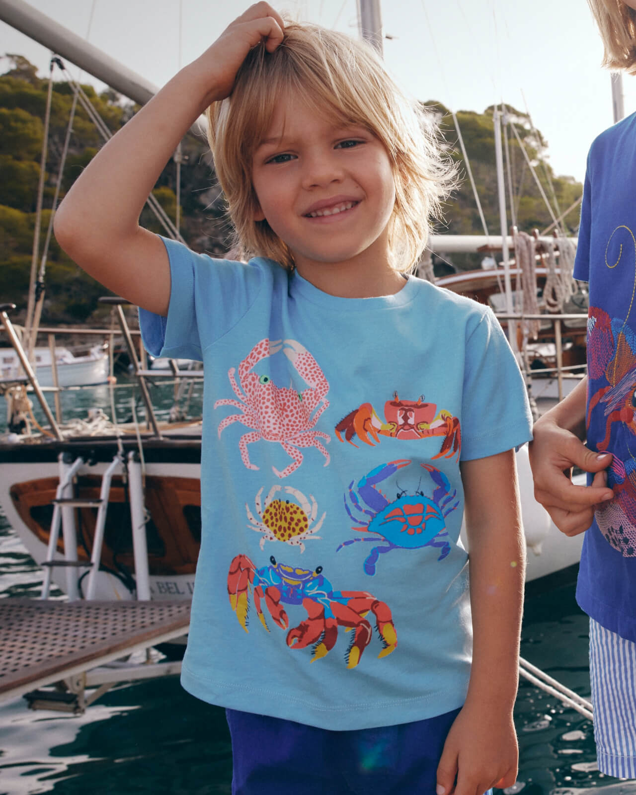 "Shop the T-Shirt" linking to boys' Short Sleeve Printed T-Shirt- Vintage Blue Crabs