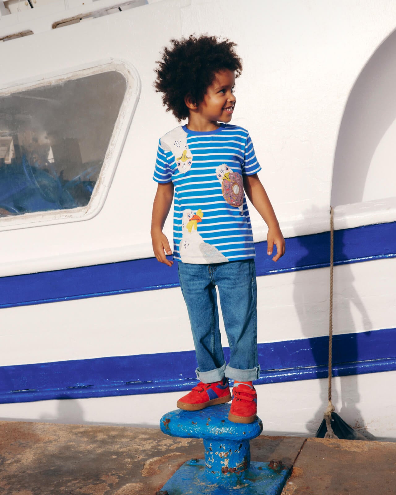 "Shop the T-Shirt" linking to boys' Short Sleeve Applique T-Shirt - Gallery Blue Stripe Seagulls