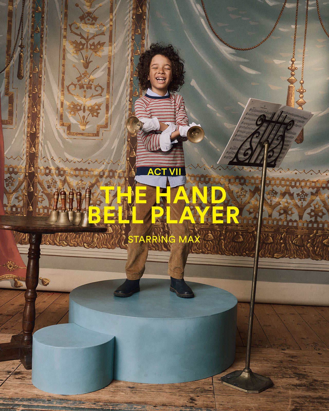 Child playing handbells in a decorative room with text overlay