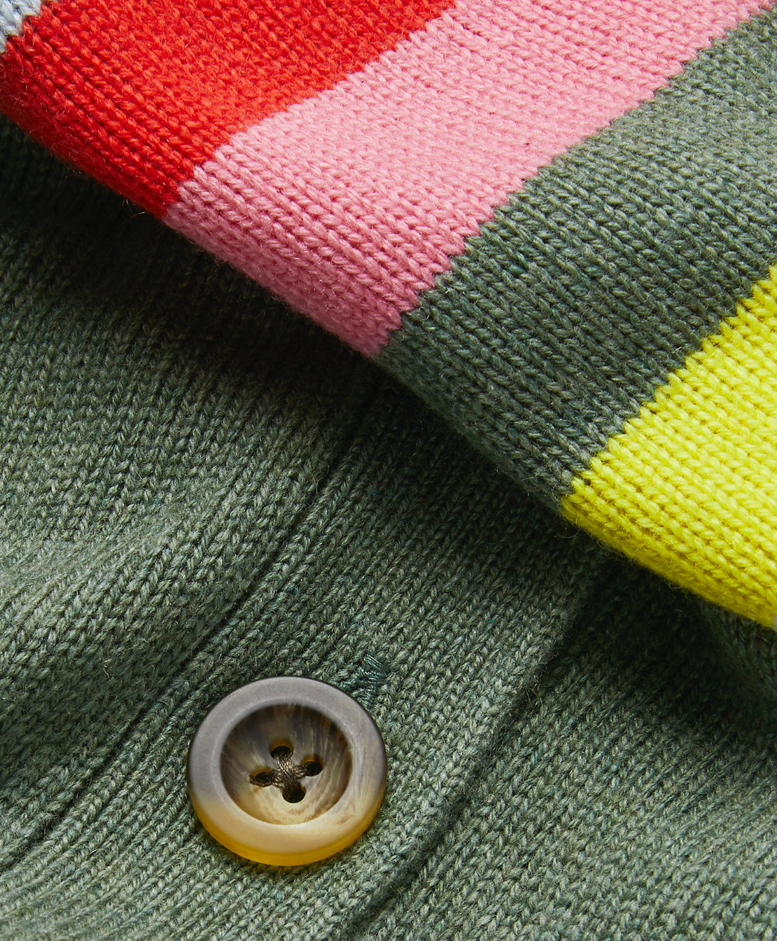 Close up of green and multi-coloured stripe wool cloth